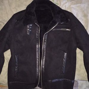 This is a Guess Aviator Fur Coat.